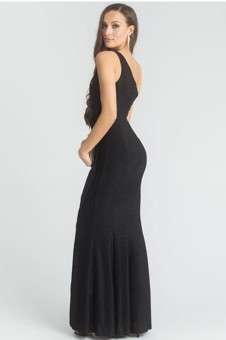 Woman wearing a black evening gown on a white background