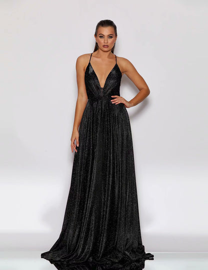 Woman wearing a black evening gown against a white background