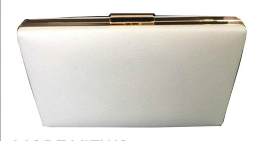 White clutch bag with gold accents on a white background