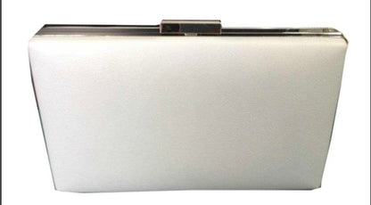 White clutch bag with a metallic frame on a white background