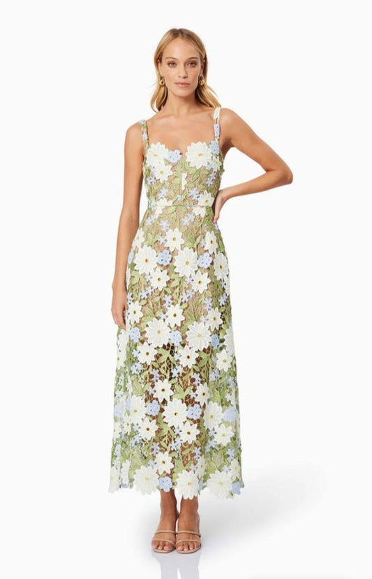 Woman wearing a floral dress on a white background